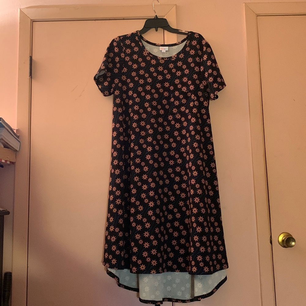 Large black Carly dress with peach flowers.